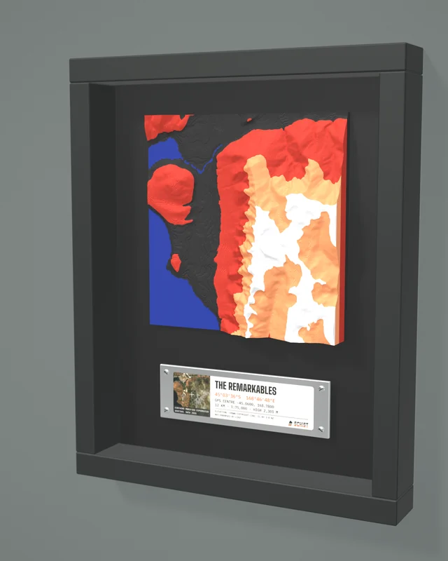 Render: the The Remarkables tile in a dark shadow-box frame with a coordinate plate below it