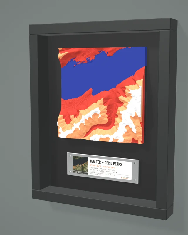 Render: the Walter + Cecil Peaks tile in a dark shadow-box frame with a coordinate plate below it